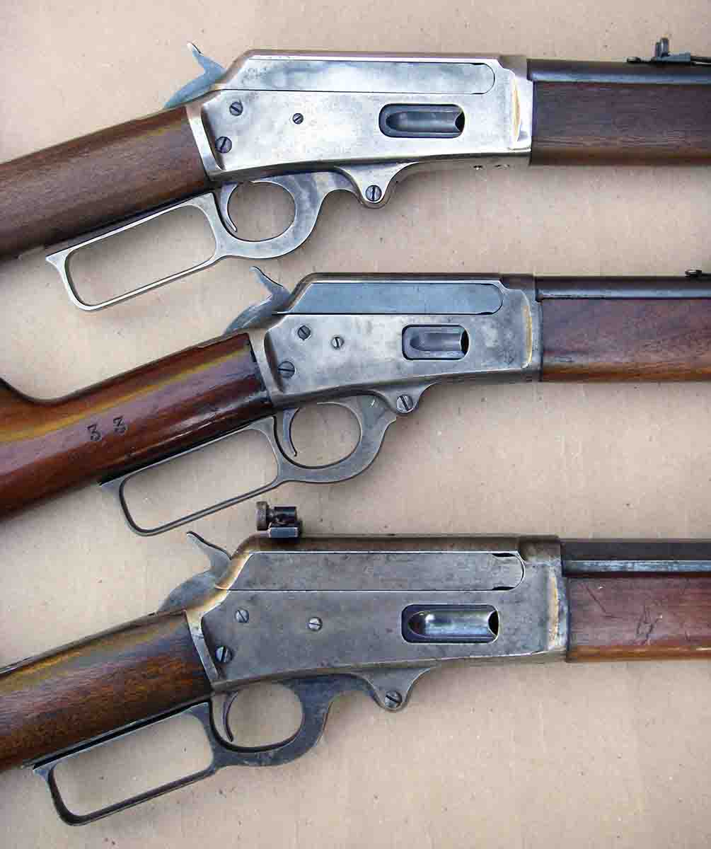 The Marlin Model 1893 (top) housed .30-30 length cartridges, while the Model 1894 (middle) was designed for the .44-40 and similar length cartridges. The bottom rifle is an original Model 1895, which was designed for large cartridges such as the .45-70.